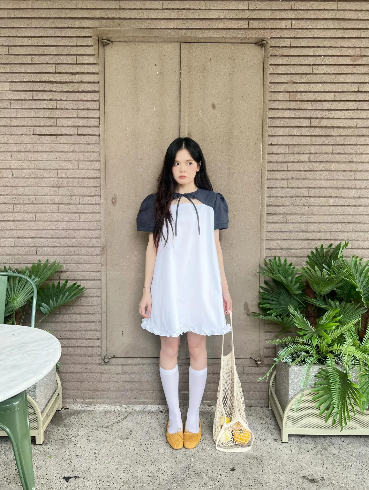 Đầm babydoll trắng phối tây caro xanh