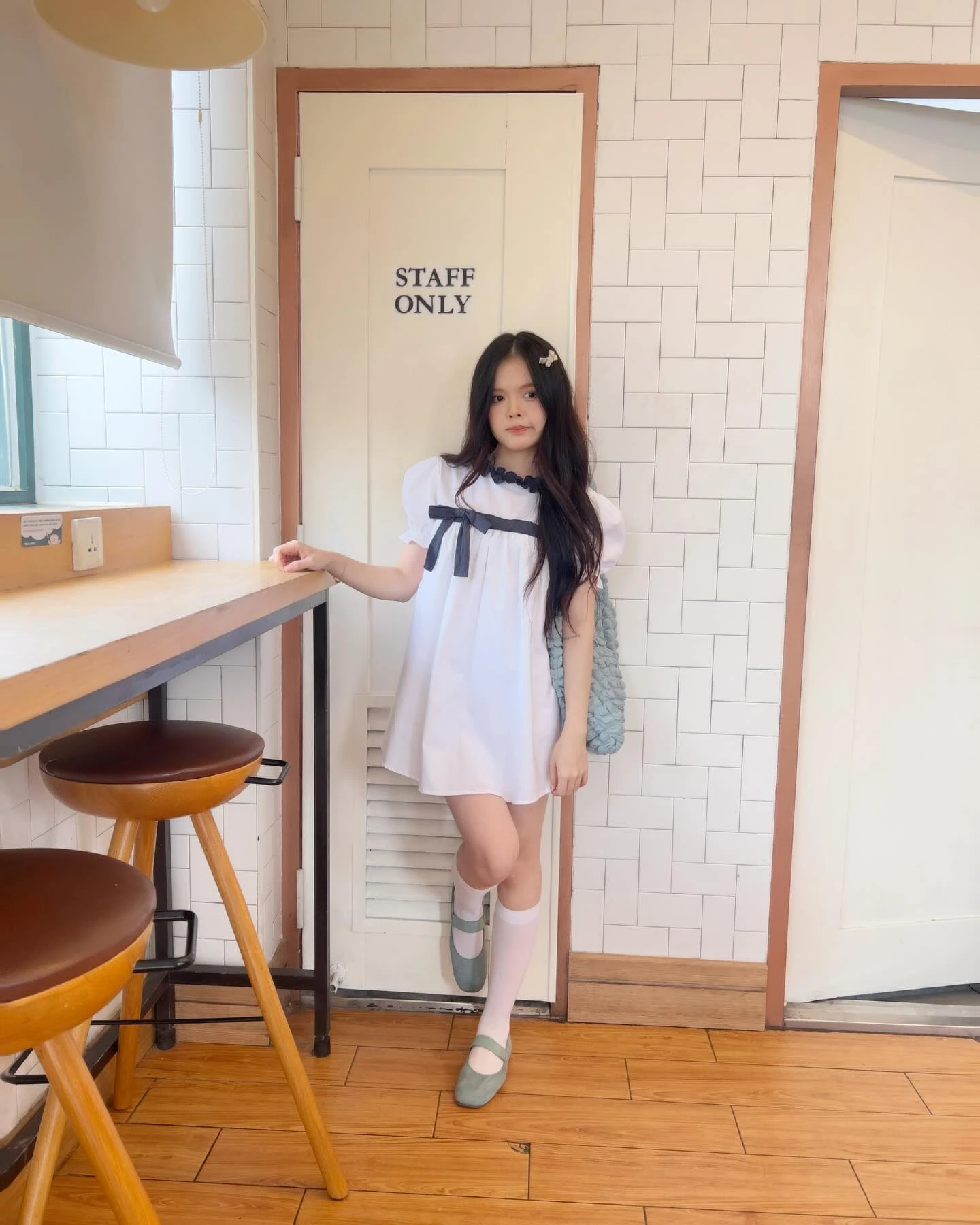 Đầm babydoll trắng phối caro xanh line giữa