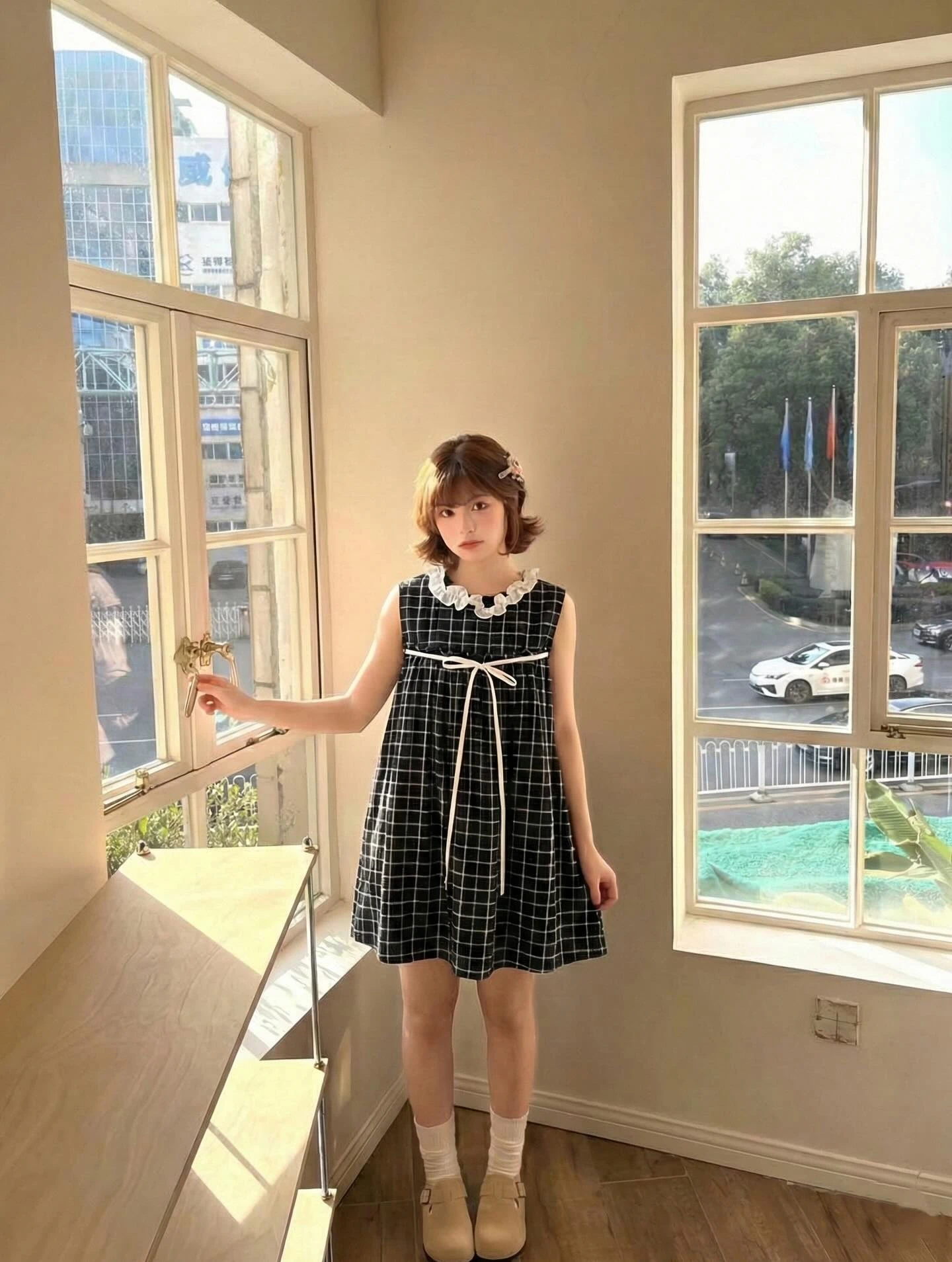 Đầm babydoll sát nách caro đen