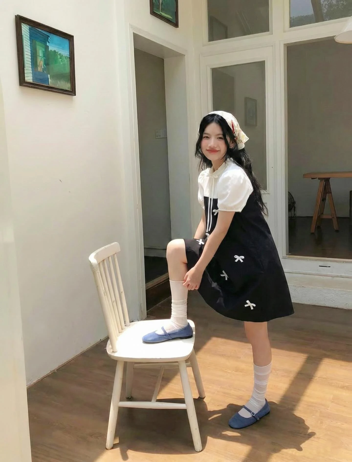 Đầm babydoll đen phối kem nhiều nơ 