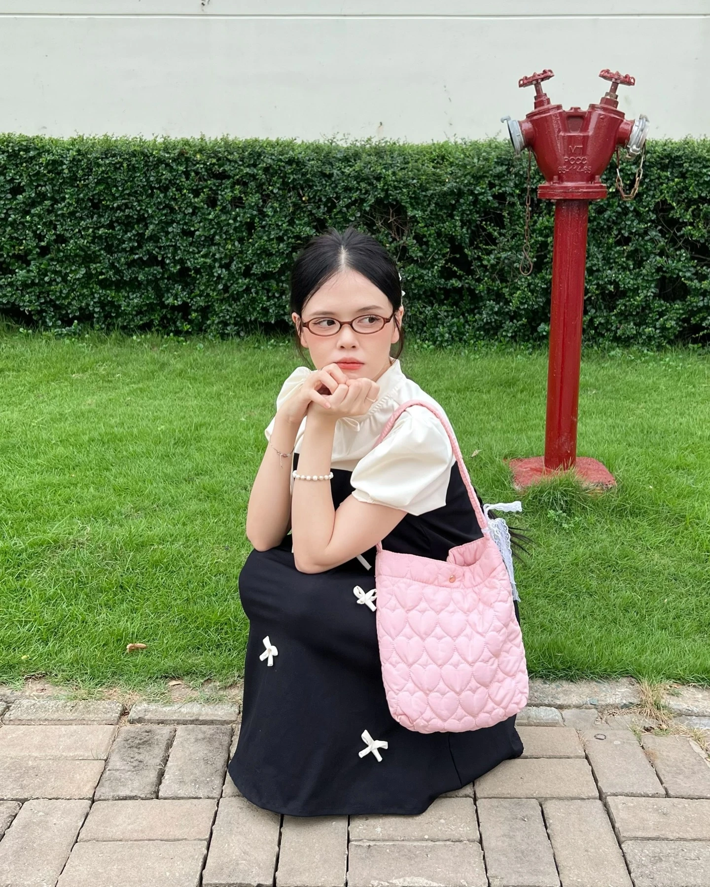 Đầm babydoll đen phối kem nhiều nơ 