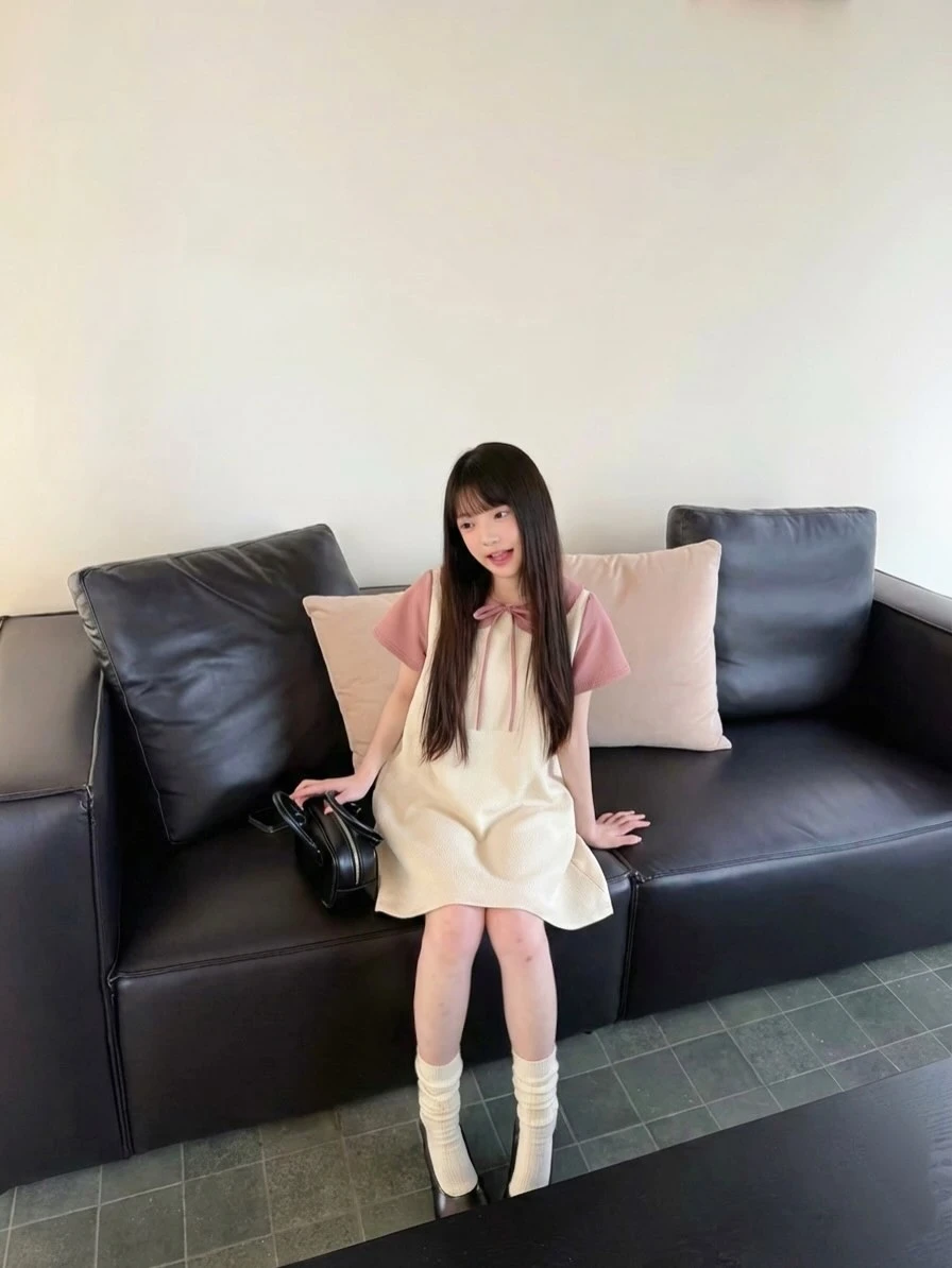 Đầm babydoll kem phối hồng nơ