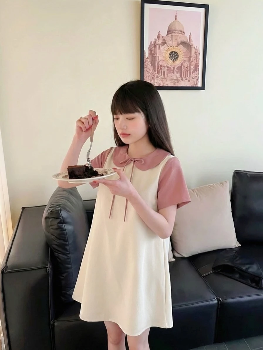 Đầm babydoll kem phối hồng nơ