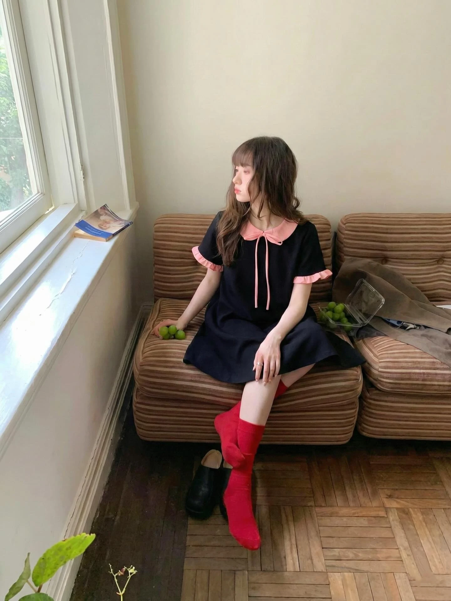 Đầm babydoll đen phối hồng bèo