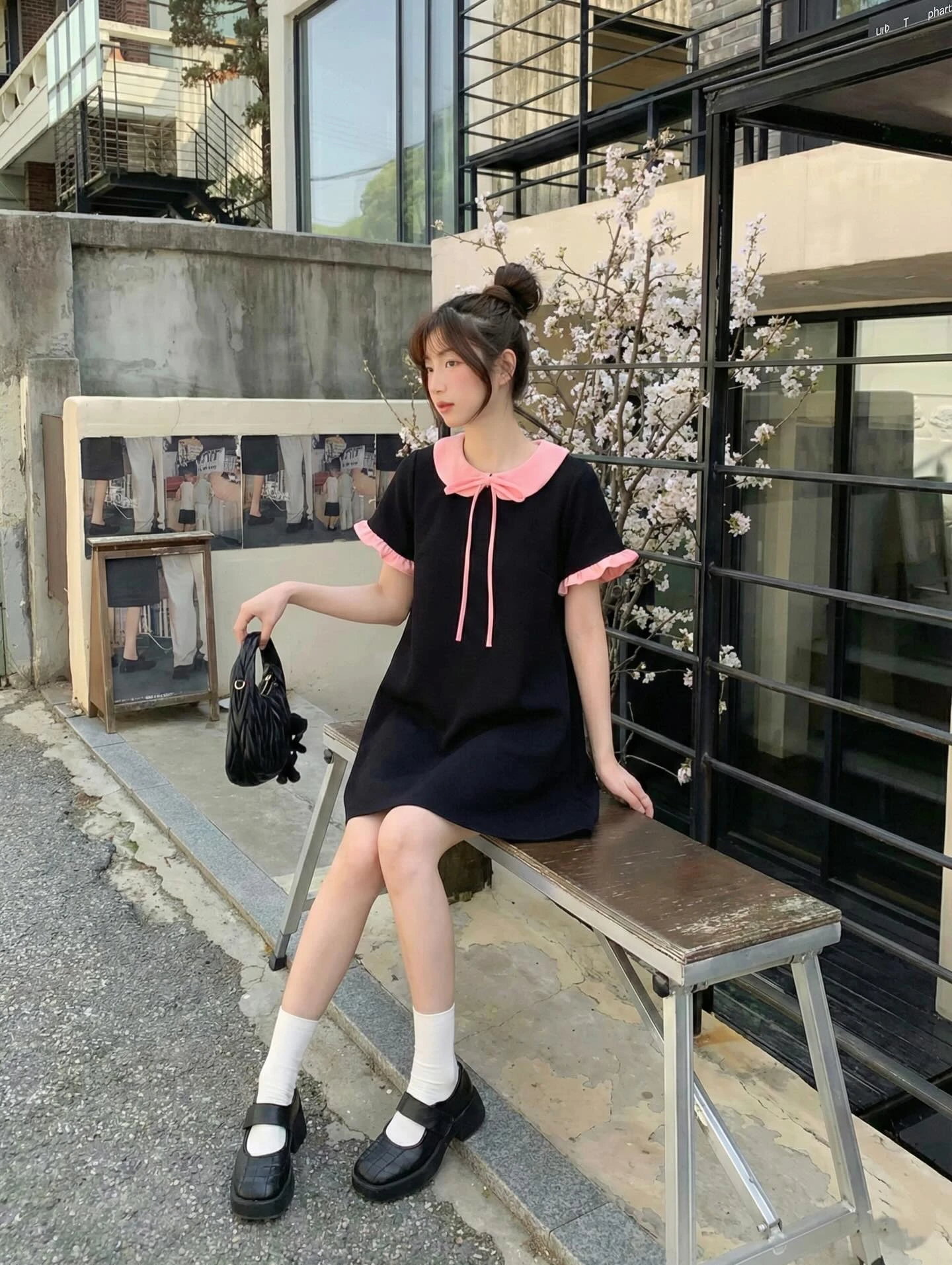 Đầm babydoll đen phối hồng bèo