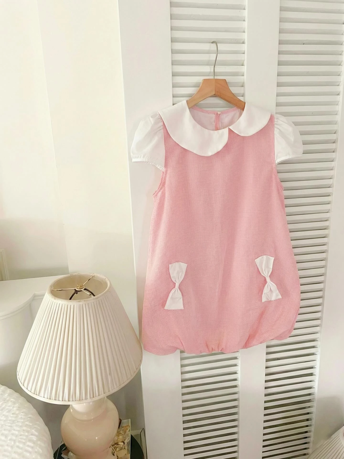 Đầm babydoll caro hồng phối trắng tùng bí
