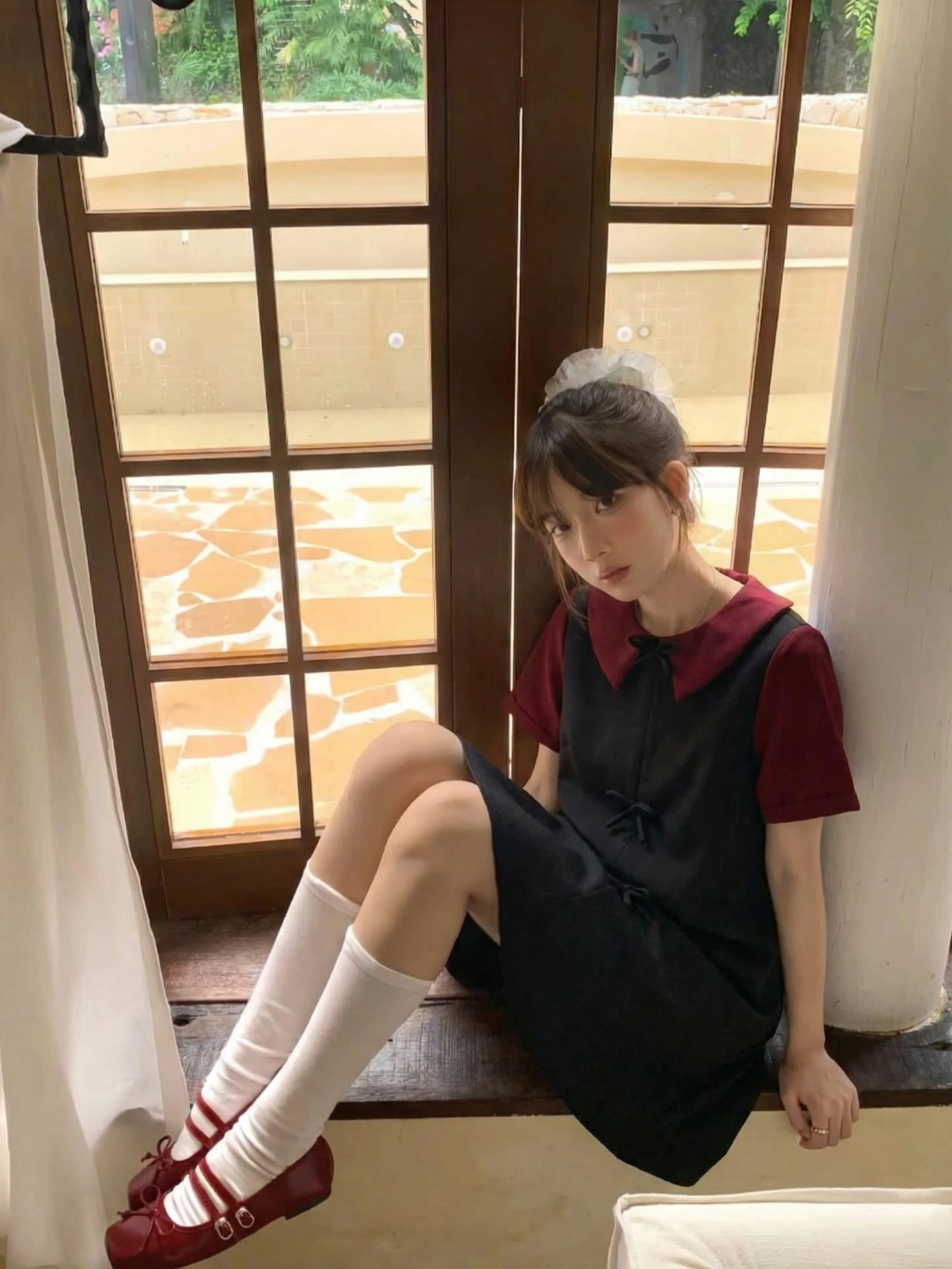 Đầm babydoll đen nơ phối đỏ đô