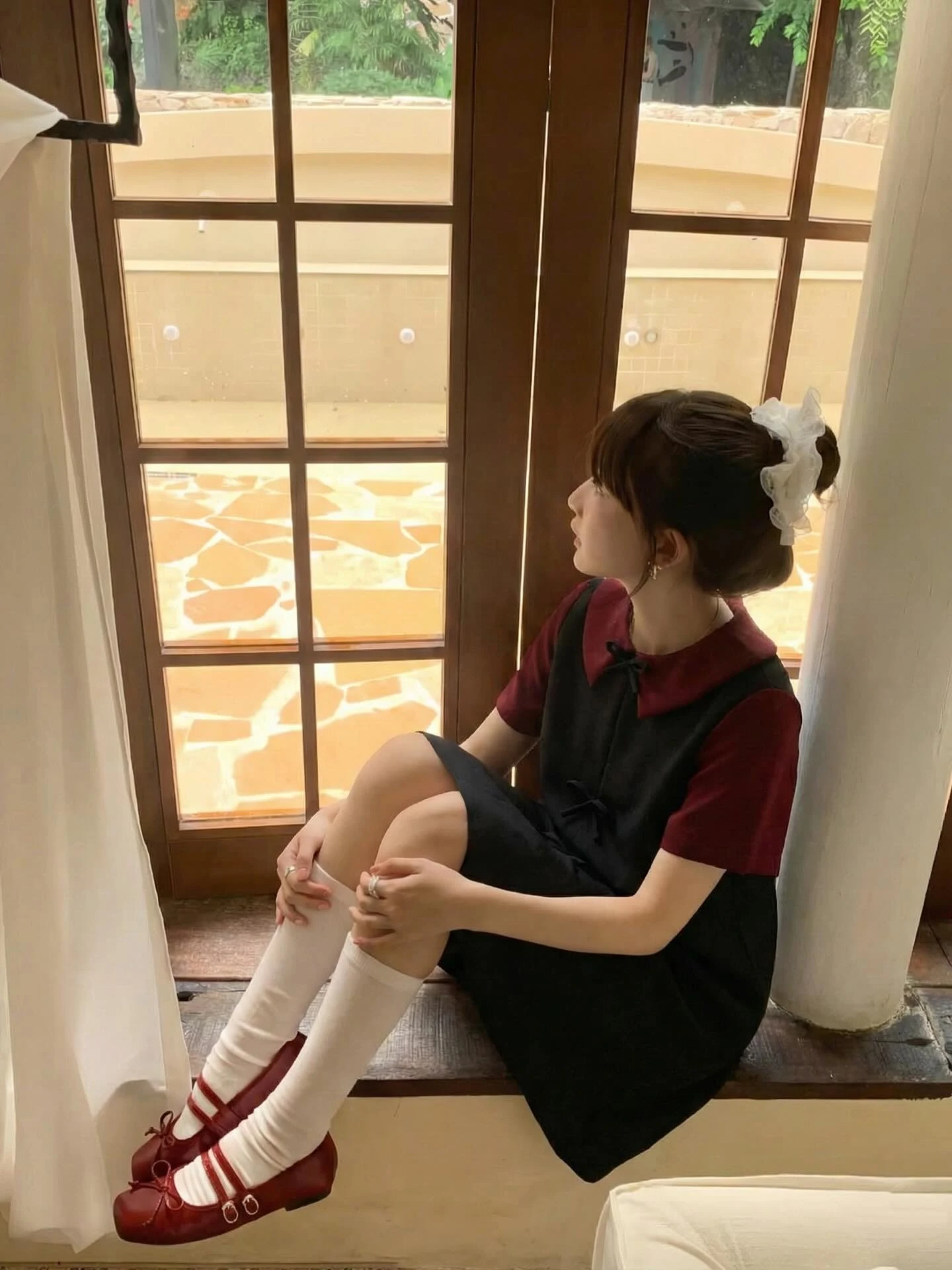 Đầm babydoll đen nơ phối đỏ đô