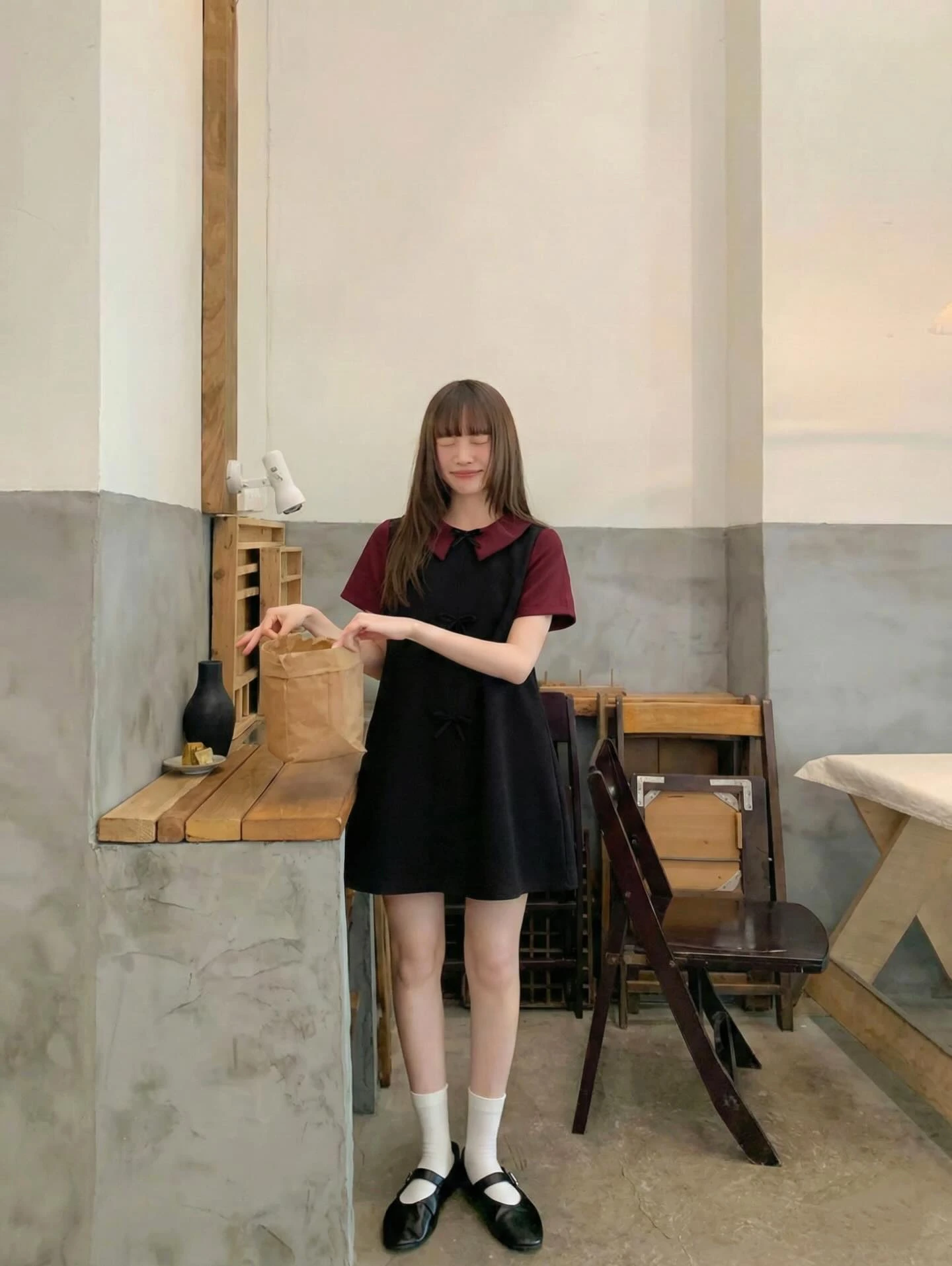 Đầm babydoll đen nơ phối đỏ đô