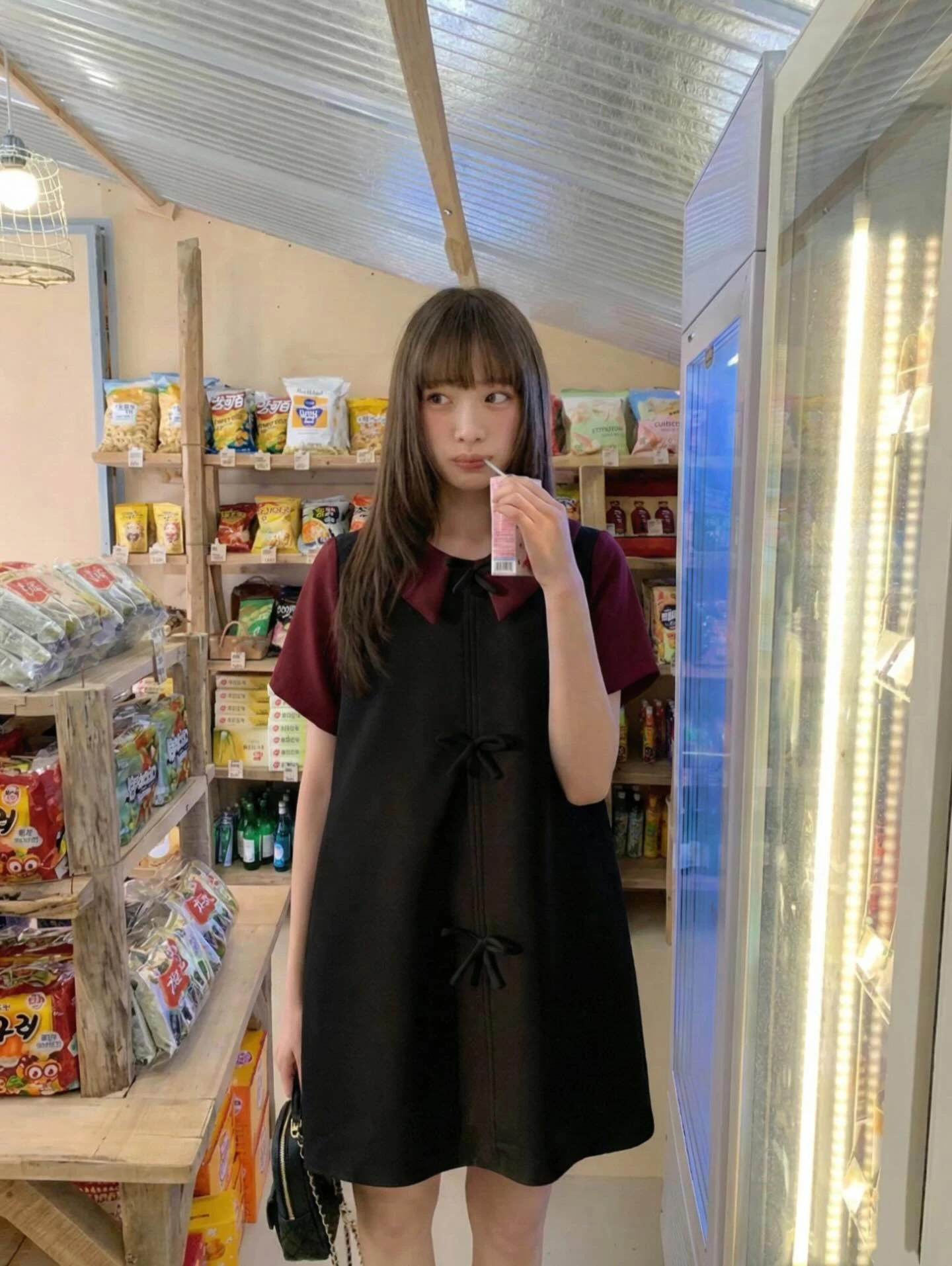 Đầm babydoll đen nơ phối đỏ đô